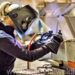 female journeyman-welder